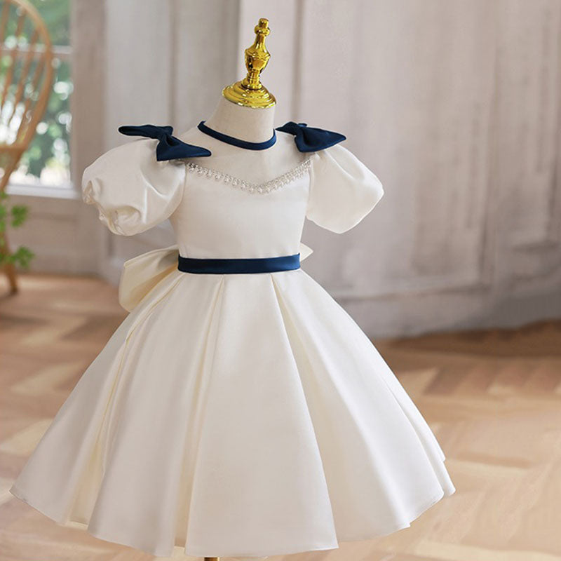 White Princess Tea Length Dress with Beaded Illusion Neckline & Bow | Special Occasion Girls Dress