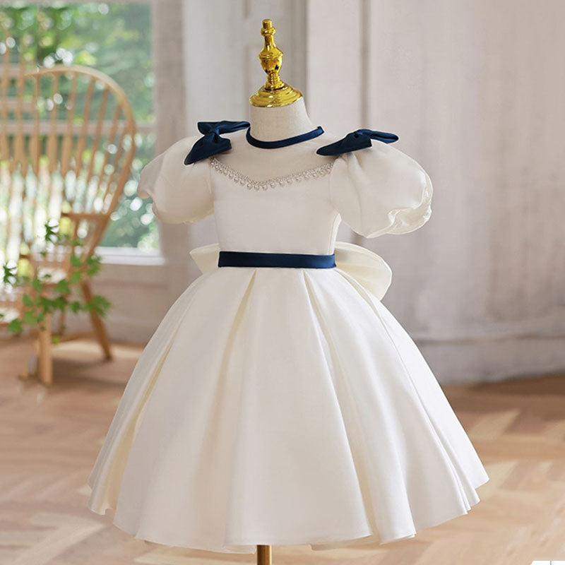 White Princess Tea Length Dress with Beaded Illusion Neckline & Bow | Special Occasion Girls Dress