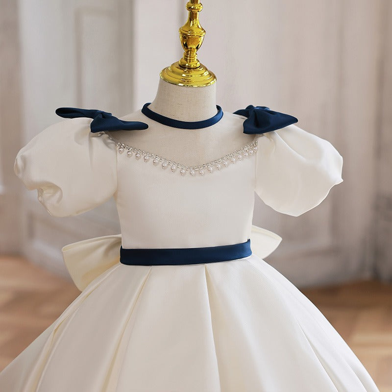 White Princess Tea Length Dress with Beaded Illusion Neckline & Bow | Special Occasion Girls Dress