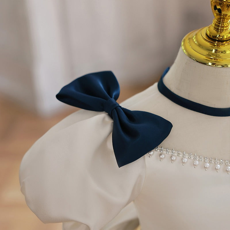 White Princess Tea Length Dress with Beaded Illusion Neckline & Bow | Special Occasion Girls Dress