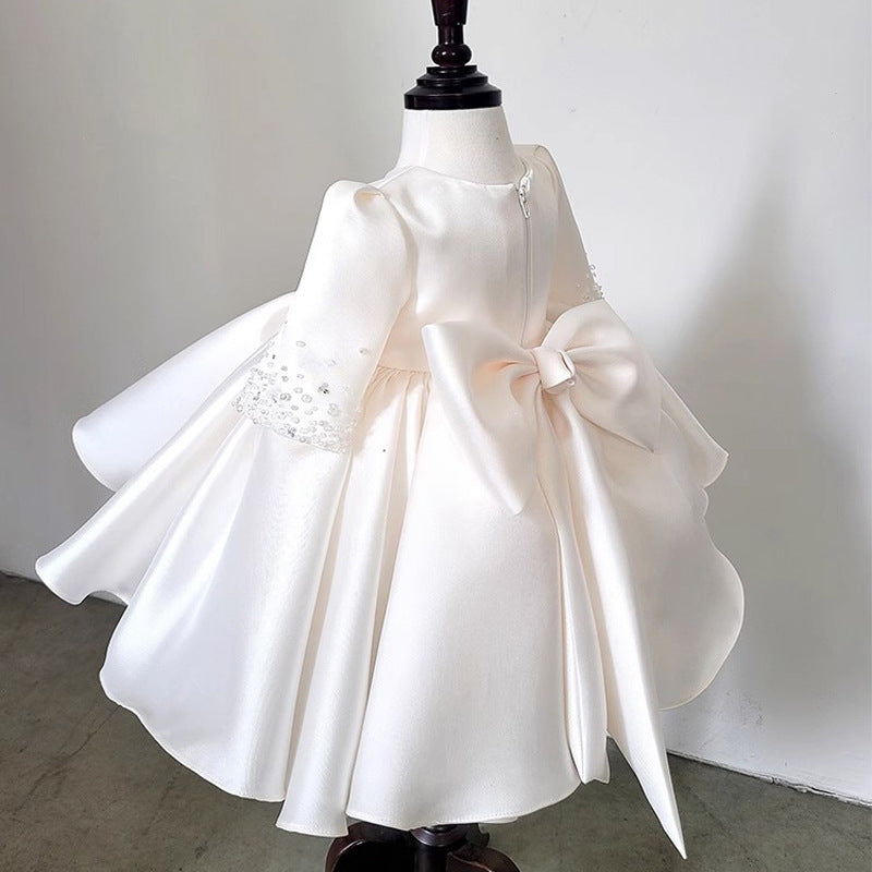 White Ball Gown Knee Length Dress for Girls with Sequins and Bow - Occasion Wear