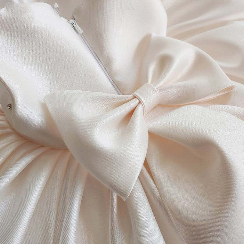 Elegant White Satin Flower Girl Dress with Bow & Beaded Details