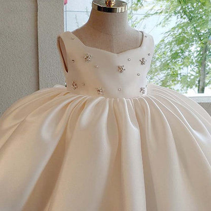 Elegant White Satin Flower Girl Dress with Bow & Beaded Details