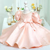 Robe princesse en satin rose avec paillettes et nœud dans le dos